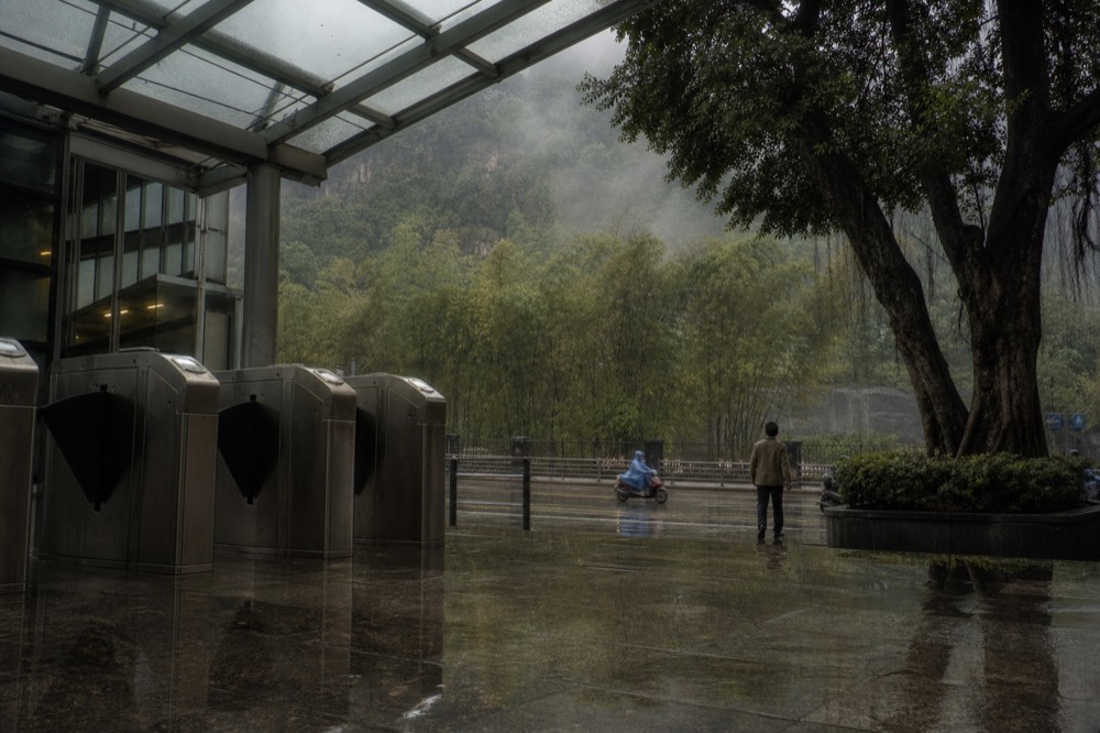 Maokong Gondola station platform with cabins, no text, no logos, no people